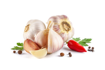 Garlic bulbs with chili pepper and parsley isolated on a white background close-up