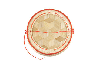 A wicker basket with a rope handle.
