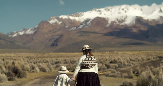 Bolivian Mother and Son Walking