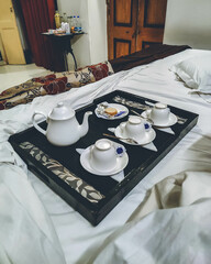 Morning bed breakfast tea set at a palace in Sankpur, West Bengal, India in January 2023....