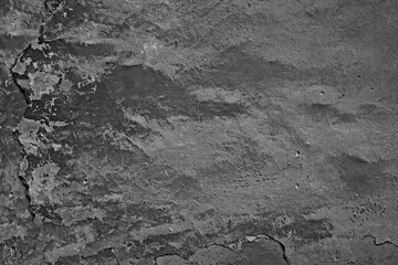 Old broken dark wall in cracks gray basis texture universal