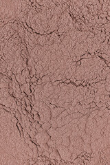 Bronze Tone Decorative Powder Dry Powder Texture for Dark Face Makeup, Tanned Skin. Vertical abstract background. layout.