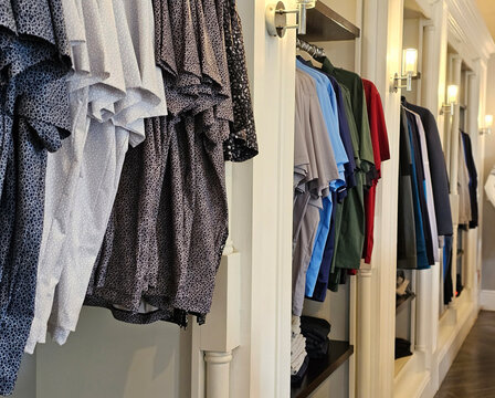 Row of Shirts Hanging on Wall
