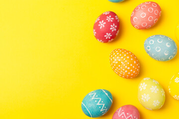Easter eggs on a bright background. Easter celebration concept. Colorful easter handmade decorated Easter eggs. Place for text. Copy space.