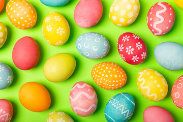 Easter eggs on a bright background. Easter celebration concept. Colorful easter handmade decorated Easter eggs. Place for text. Copy space.