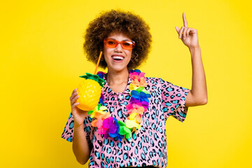 Photo of funky excited lady dressed leopard print shirt sunglass enjoying juice pointing empty...