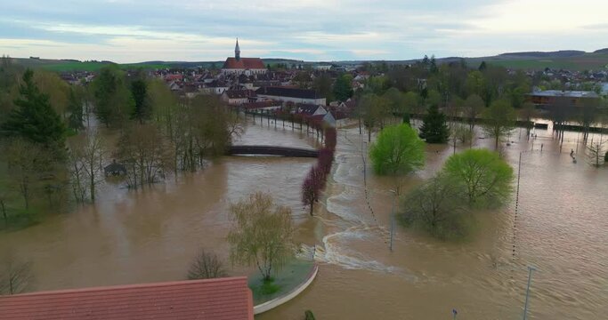 Natural disaster in Burgundy, France. Water flooded a city in the Yonne department. Aerial view of the floods in the center of France. Yonne river in flood in Chablis town. Spring flood 2024