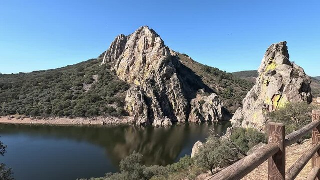 Beautiful view of iconic Pe&ntilde;a Falcon and Tagus river from Salto del Gitano viewpoint. It is a famous birdwatching spot in Monfrague National Park, Caceres, Extremadura, Spain
