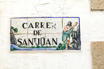 Street name mosaic in Sitges, Catalonia, Spain. John the Baptist
