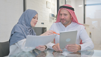 Muslim Entrepreneurs Working Together in Office