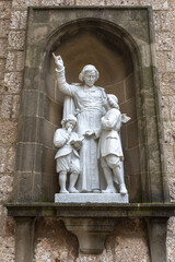 Statue in Montserrat monastery, Catalonia, Spain : Saint Jean-Baptiste de la Salle with children