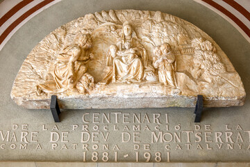 Montserrat monastery, Catalonia, Spain. Church tympanum reliefs