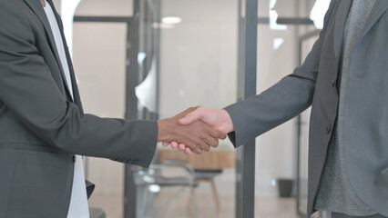 Close up of Business People Shaking Hand