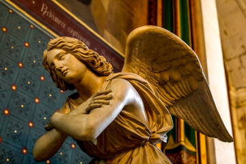 Saint Gervais-Saint Protais catholic church, Paris, France. Angel statue sculpted by Jean-Pierre...