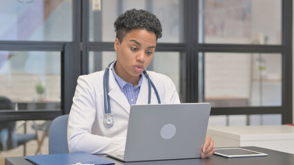 Mixed Race Female Doctor Talking with Patient Video Conference