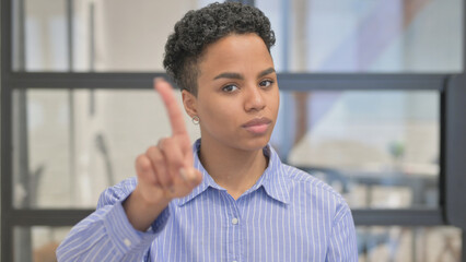 Portrait of Rejecting African Woman with Disliking Gesture