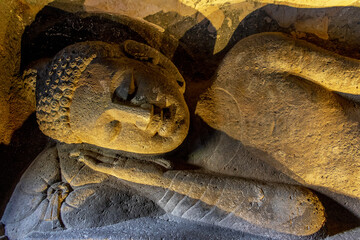 Ajanta caves, a UNESCO World Heritage Site in Maharashtra, India. Cave nÂ°26. Mahaparinirvana of...
