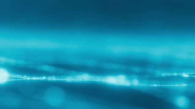 Seamless reversible loop with waves of blinking dots flying through space. Loopable abstract light blue background. AI, cyberspace,big data transfer,metaverse. artificial intelligence