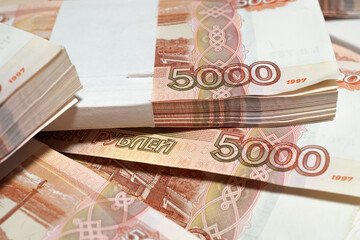 Russian money, five thousand bills close-up, business concept. Selective focus, blur.