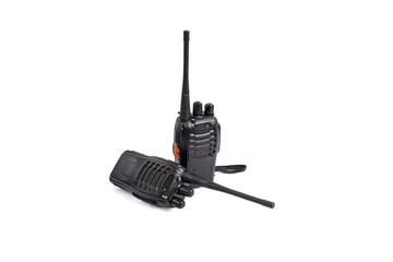 Two black plastic walkie talkies isolated on white background
