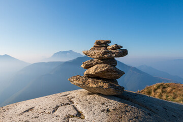 Stack of stones on top of the mountain represent spirit of Zen.