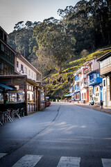 Scenic village road in Lastres, Asturias, offering a blend of cultural charm and natural beauty.