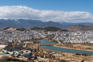 Zhongdian, China: City view of Zhongdian on the Tibetan plateau in the Yunnan province of China with Buddhist temple.