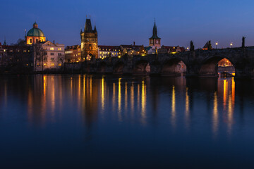 View of the Vltava River and the Charles Bridge in Prague at the sunset. Czech Republic.