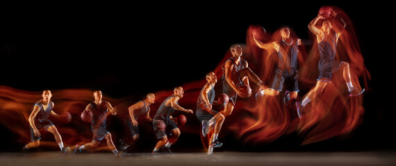 Development of movements. Concentrated young man, basketball player in motion with ball on black...