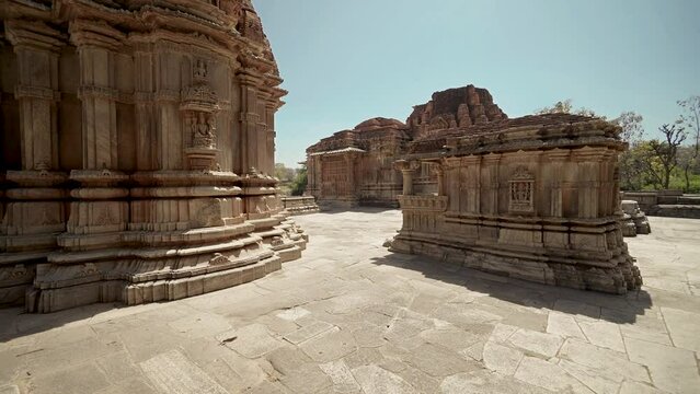 Cinematic Shot of Indian Ancient Hindu Temple named Sahastrabahu, a historic temple made with stone carving and art sculptures in Udaipur - Rajasthan, India