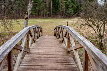 The boardwalks leading to the Vilce Nature Park. Latvia. Wooden walkway in early spring.