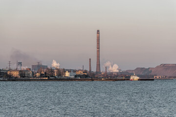 Fototapeta premium Factory with air pollution smoke from chimneys, environmental problems. Industry air pollution concept. Ecological catastrophe.