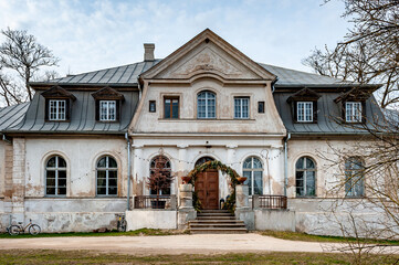 Abgunste manor is a cultural monument of national significance. View of a beautiful old mansion in Latvia.