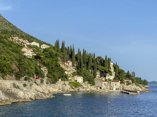 Trsteno village by the Adriatic sea on the Dalmatian coast, Croatia - obrazy, fototapety, plakaty