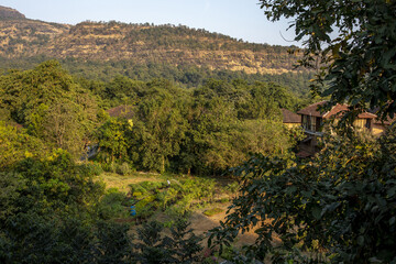 Goverdan ecovillage at the foot of the Sahyadri mountain range, Maharashtra, India - obrazy, fototapety, plakaty