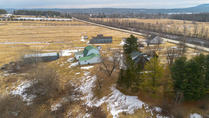Aerial view of the Canadian agricultural countryside in Quebec in spring - 777515944