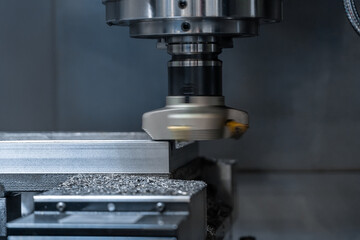 A detailed close-up of a machine meticulously cutting a piece of metal with precision and accuracy