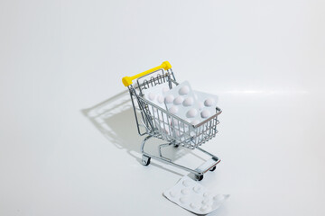 In a shopping cart buying some costly medicines due to inflation
