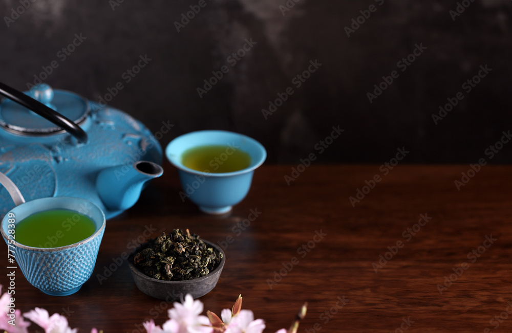 Poster tea ceremony green tea with sakura branches