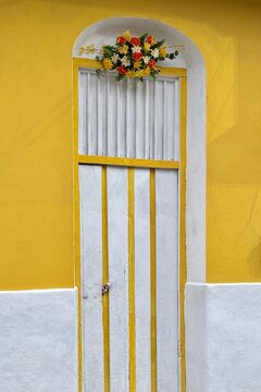 Beautiful decorated door of a house in Flores Island in Guatemala