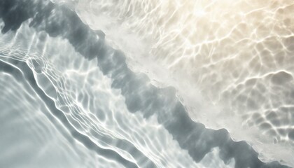 Obraz premium Ripple water texture on white background. Shadow of water on sunlight. Mockup for product spa or travel background. Marble blue water surface as wallpaper background