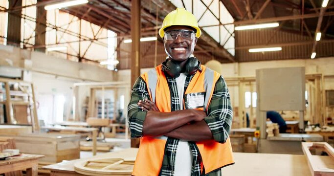 Portrait, black man and architect or builder with smile in construction site, wood and architecture of home. Employee, staff and male person with headphones, happy and helmet for protection in job