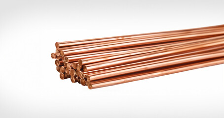 The image features a bundle of shiny, smooth copper rods artistically arranged and placed against a white background, emphasizing purity and simplicity - Powered by Adobe