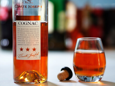 In this photo illustration, a bottle of Comte Joseoh Cognac  seen displayed on a table.