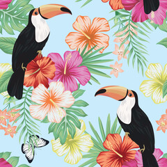 Tropical vintage palm leaves, hibiscus flower, toucan  floral seamless pattern blue background. Exotic jungle wallpaper.