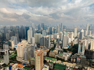 Fototapeta premium Residential area and office buildings in Makati City. Skyline in Metro Manila, Philippines.