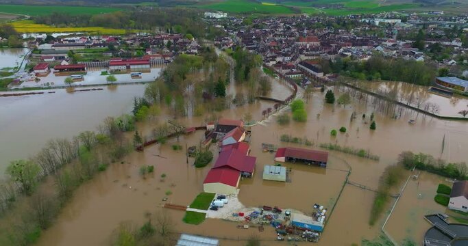 Natural disaster in Burgundy, France. Water flooded a city in the Yonne department. Aerial view of the floods in the center of France. Yonne river in flood in Chablis town. Spring flood 2024