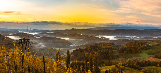 Autumn View from South Styrian route in Austria at hills in Slovenia during sunraise.