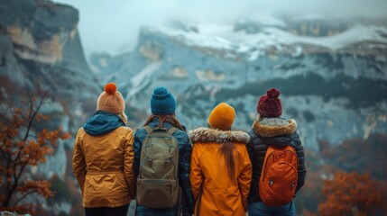 Group of Hikers Standing in Front of Mountain