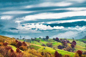 Beautiful nature of the carpathians in the hills of the sky, forests and a small village - obrazy, fototapety, plakaty